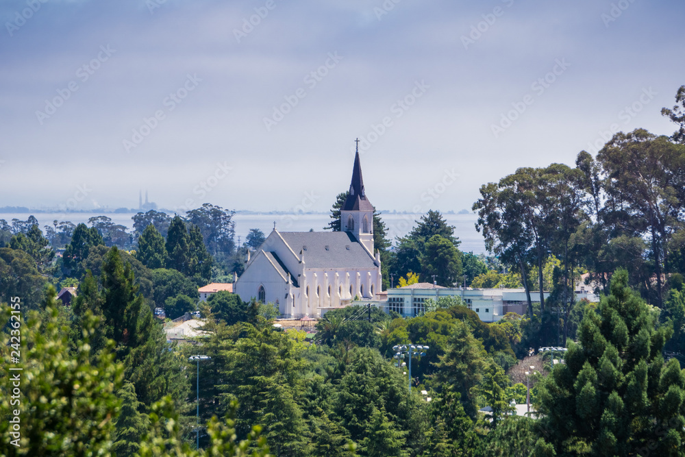 Aerial view of the Holy Cross Catholic Church in Santa Cruz from the trails of Pogonip Open Space Preserve, California Aerial view of the Holy Cross Catholic Church in Santa Cruz from the trails of Pogonip Open Space Preserve, California