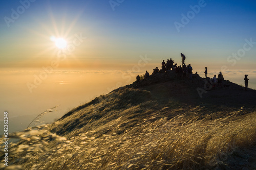 Colorful sunset over a sea of clouds, Mission Peak, south San Francisco bay area, California