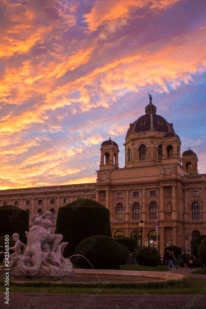 Maria Theresa Square in Vienna. Museum of Natural History in Vienna. Art History Museum in Vienna and the fountain Triton and Naiad. On the Sunset.