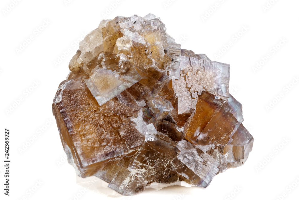 Macro mineral stone yellow Fluorite on a white background Macro mineral stone yellow Fluorite on a white background
