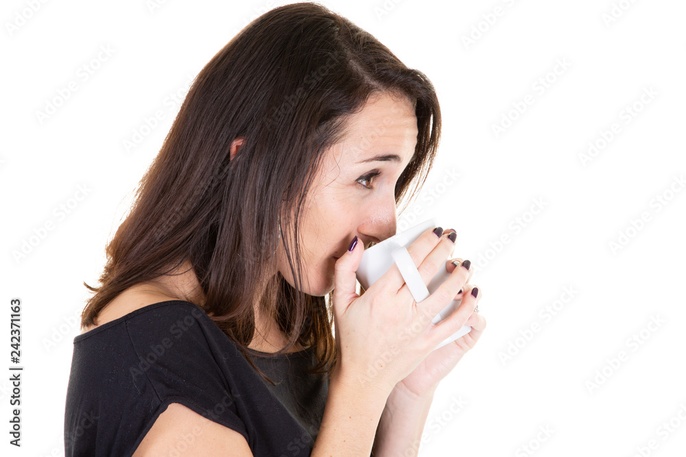 Cheerful woman drinking morning coffee on white background Cheerful woman drinking morning coffee on white background