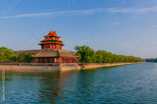 Corner tower and moat of Forbidden City under blue sky  in Beijing  China