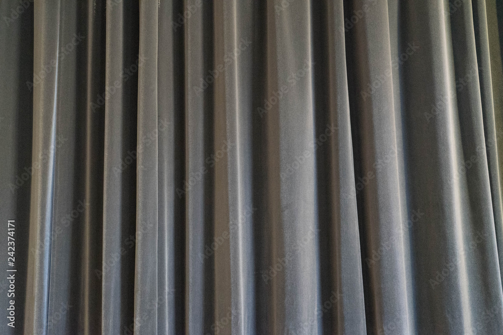 Gray curtain of a theater