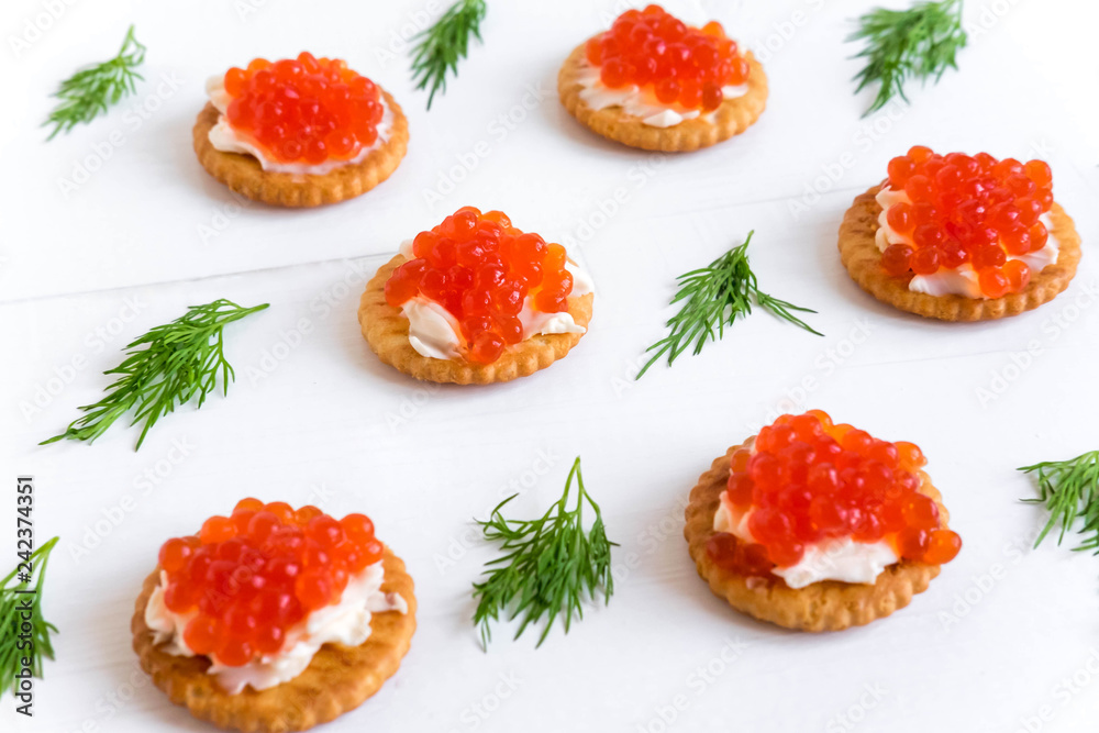 Basis for a banner with sandwiches with red caviar. Salmon caviar for print design, web site, banner, flyer. Appetizer with red caviar Basis for a banner with sandwiches with red caviar. Salmon caviar for print design, web site, banner, flyer. Appetizer with red caviar
