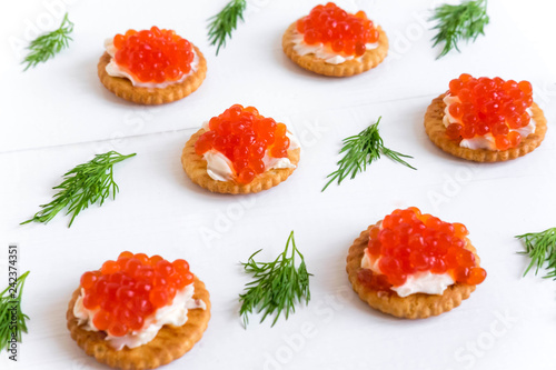 Basis for a banner with sandwiches with red caviar. Salmon caviar for print design, web site, banner, flyer. Appetizer with red caviar