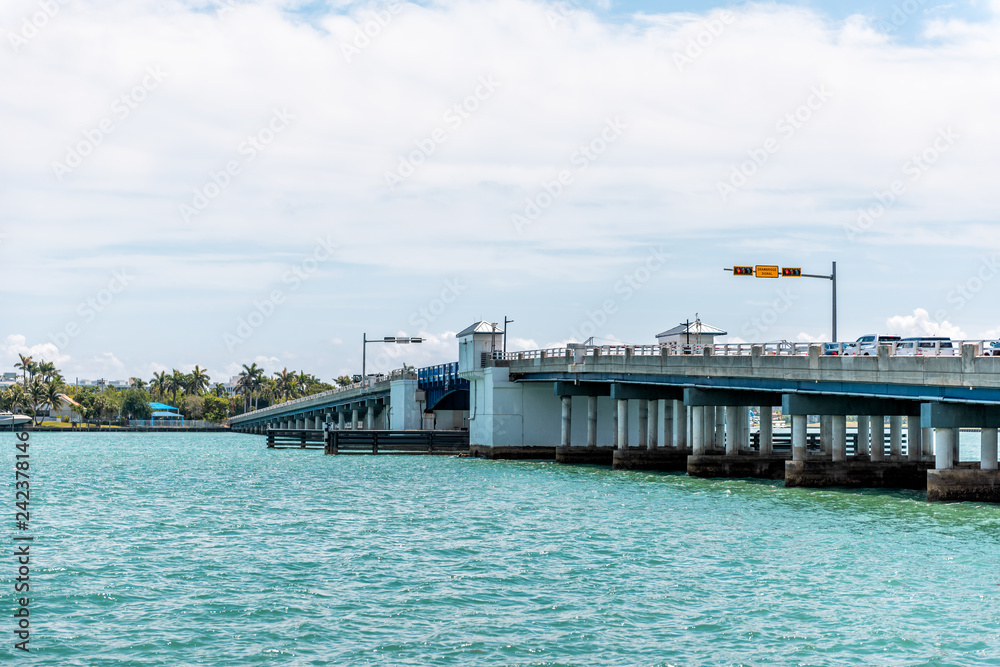 Bal Harbour, Miami, Florida with light green turquoise ocean Biscayne Bay Intracoastal water, drawbridge opening up on Broad Causeway