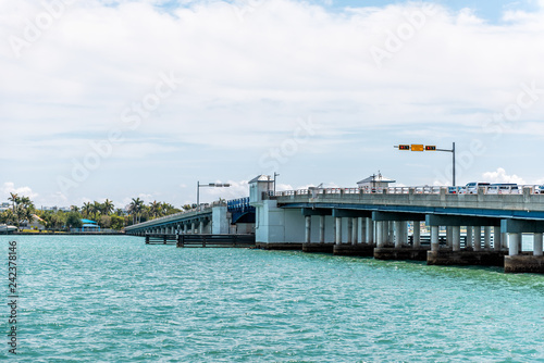 Bal Harbour  Miami  Florida with light green turquoise ocean Biscayne Bay Intracoastal water  drawbridge opening up on Broad Causeway