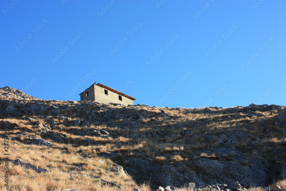 old ancient structure or abandoned and now disused building on the mountains old ancient structure or abandoned and now disused building on the mountains