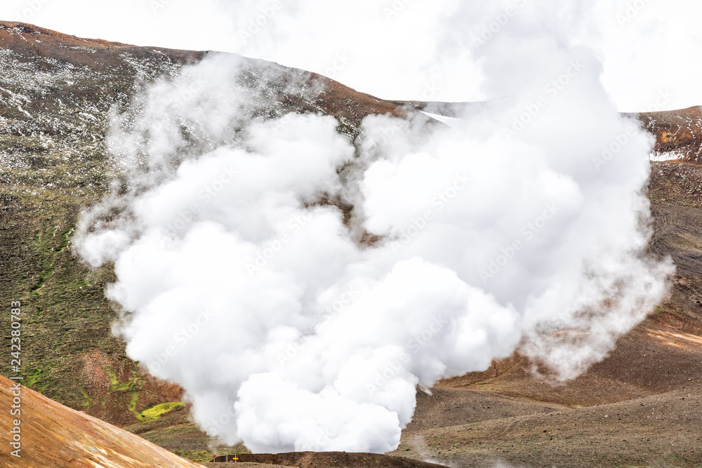 Viti Crater in Krafla caldera geothermal industrial smoke steam vapor landscape from power plant