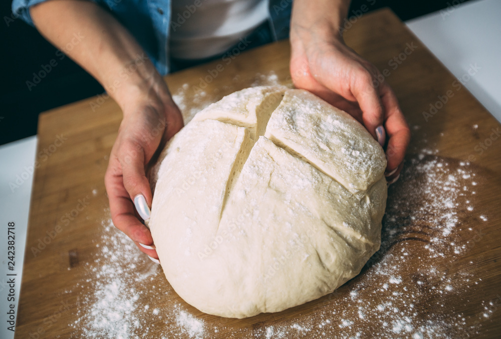 Woman kneading dough Woman kneading dough