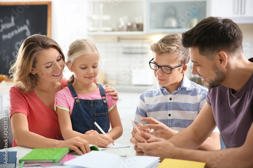 Children with parents doing...