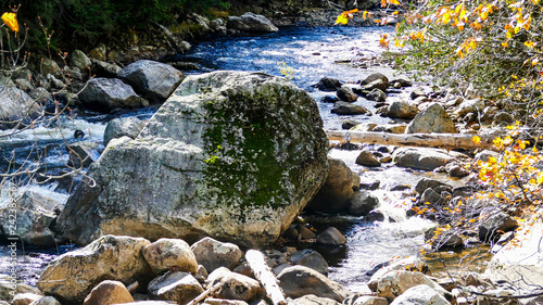 Running Stream Through Rocks and Stones photo