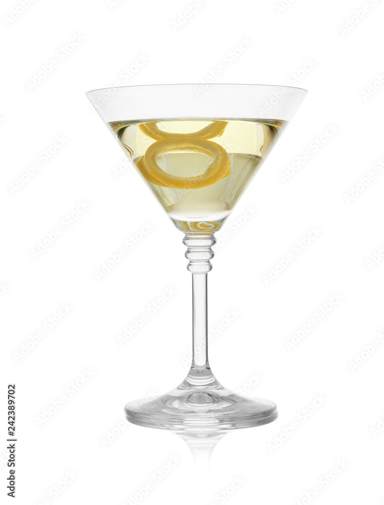 Glass of martini cocktail with lemon zest on white background