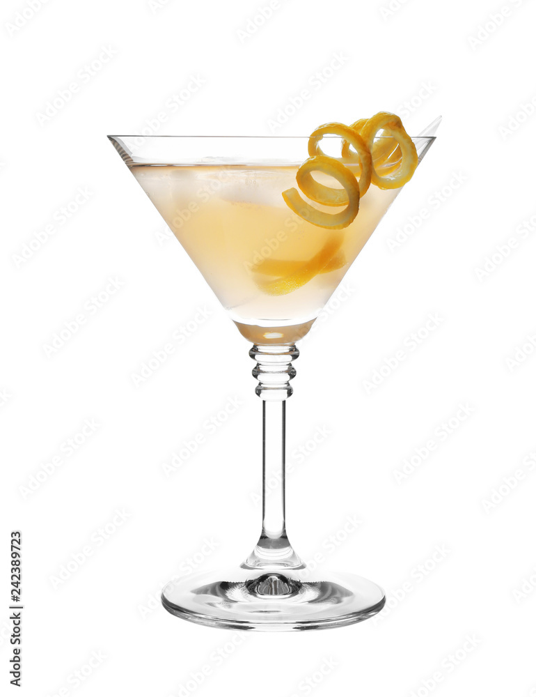 Glass of martini cocktail with ice cubes and lemon zest on white background