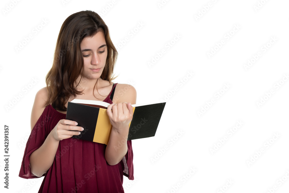 Hispanic teenage girl reading a book - Isolated on white Hispanic teenage girl reading a book - Isolated on white