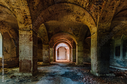 Large ancient vaulted hall of abandoned building
