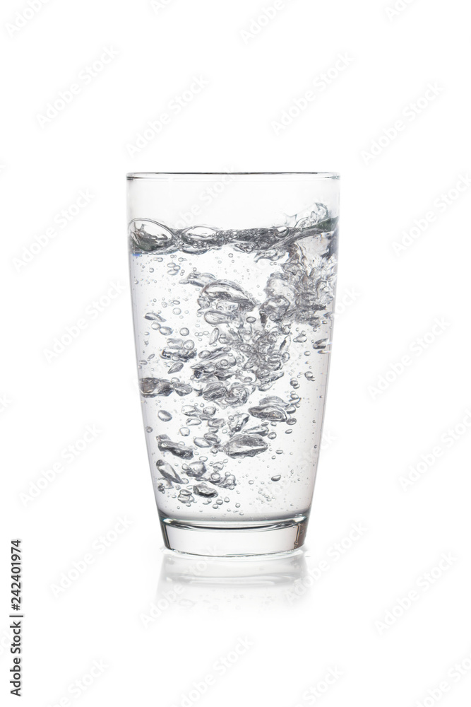 Glass of sparkling water on isolated background Glass of sparkling water on isolated background