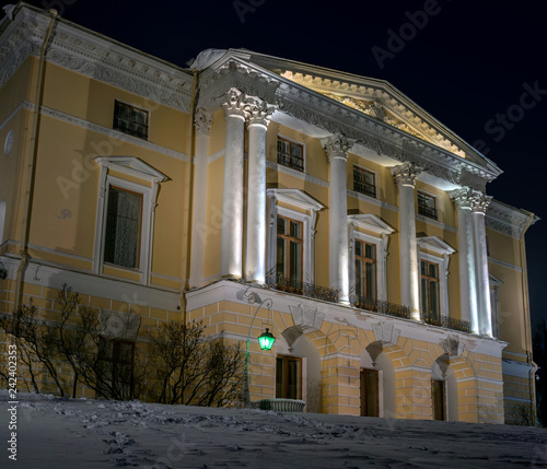 View of the Pavlovsk Imperial Palace. The palace is illuminated by spotlights. Winter is a lot of snow. Night photo. Pavlovsk, St. Petersburg, Russia