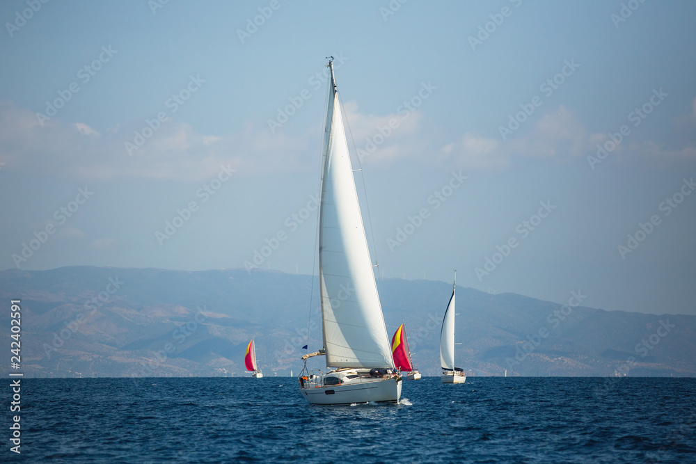 Naklejka premium Sailing luxury boats in the yacht regatta, Aegean Sea Greece.