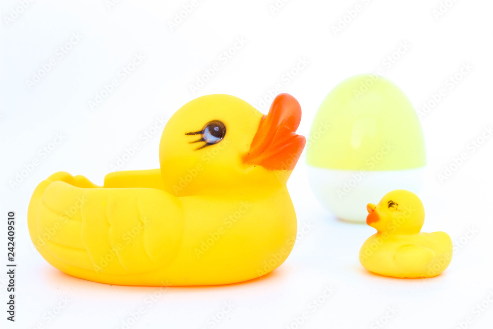 duck with mom on white background . Yellow plastic duck. Toy in baby bathroom. duck with mom on white background . Yellow plastic duck. Toy in baby bathroom.