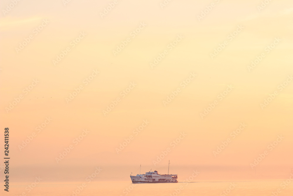 boat in the sea at sunset