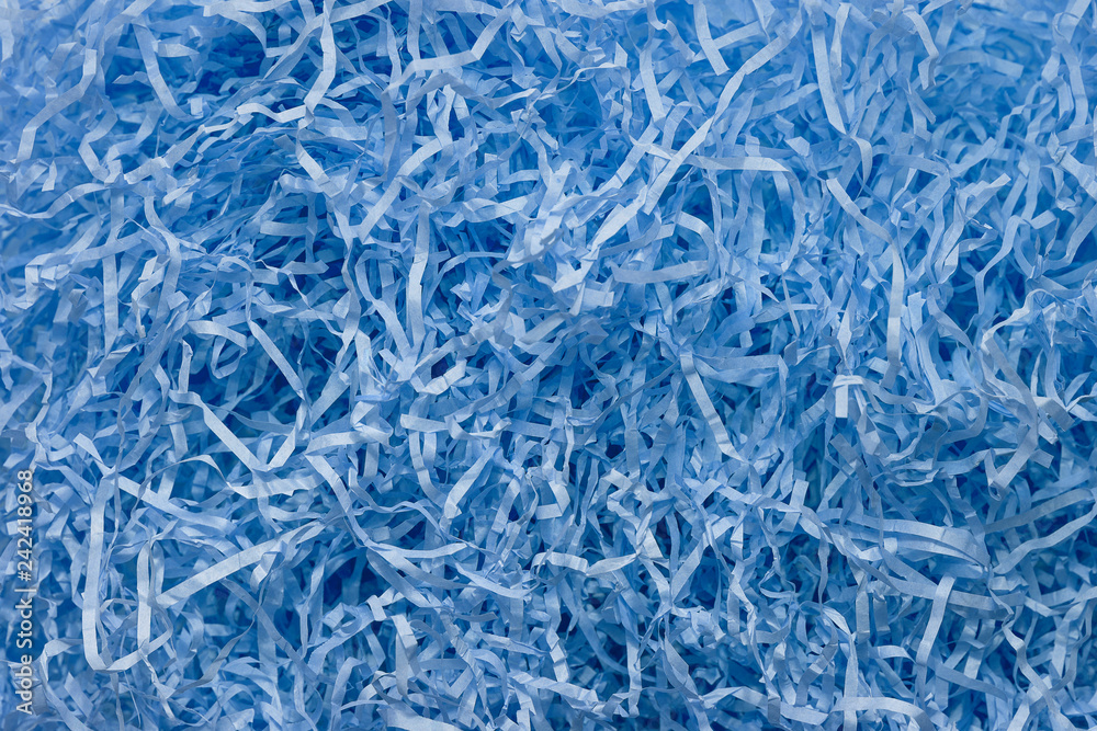 Blue background made of paper confetti. Set paper confetti photographed close-up. Abstract background Blue background made of paper confetti. Set paper confetti photographed close-up. Abstract background