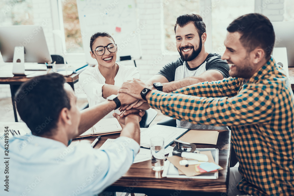Young Workers on Teambuilding in Modern Office. Young Workers on Teambuilding in Modern Office.