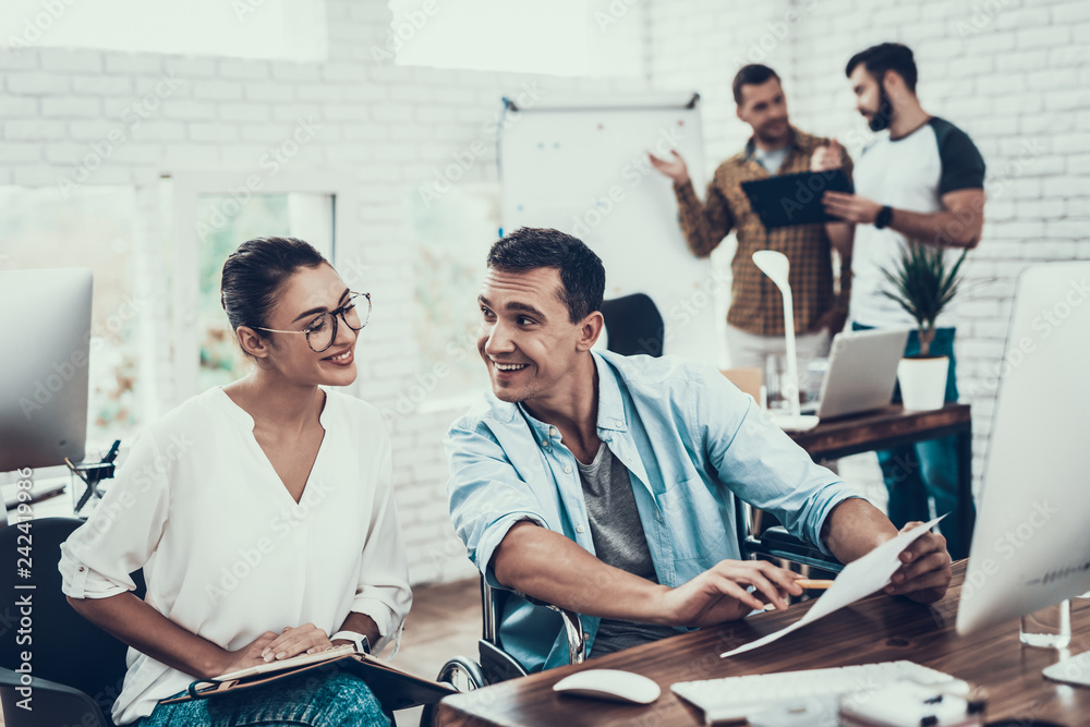 Young Workers Have Conversation in Modern Office. Young Workers Have Conversation in Modern Office.