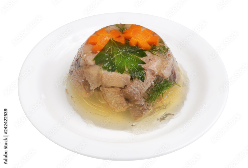 Homemade meat jelly from beef tongue with vegetables on a  plate isolated