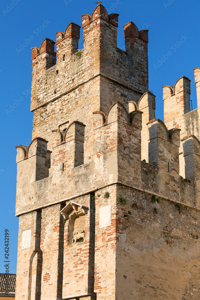13th-century medieval stone Scaliger Castle (Castello Scaligero) on Lake Garda, Sirmione, Italy