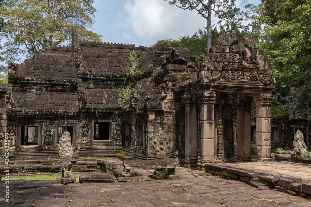 Banteay Kdei temple with portico in trees