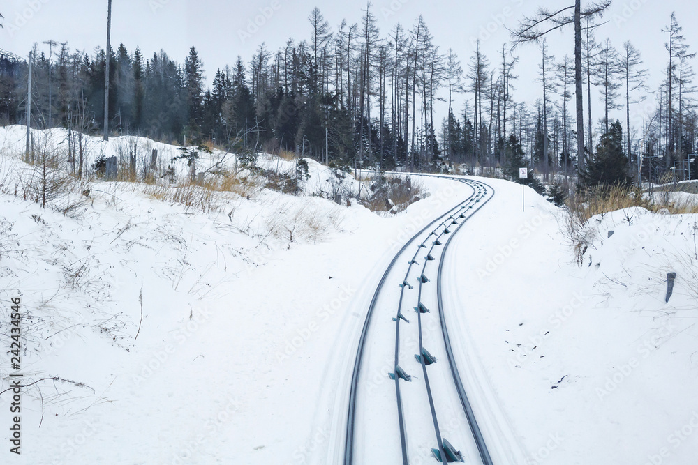 View of the funicular railway at High Tatras mountains National park in Slovakia. Railroad leads to popular ski and tourist resort Hrebienok (altitude 1285 m.) from Stary Smokovec village. View of the funicular railway at High Tatras mountains National park in Slovakia. Railroad leads to popular ski and tourist resort Hrebienok (altitude 1285 m.) from Stary Smokovec village.