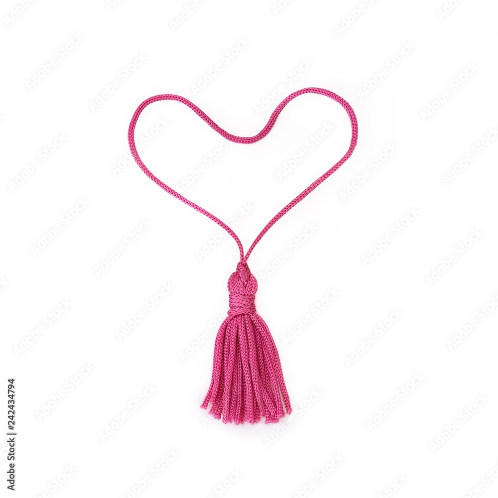Pink heart of silk tassels isolated on white background Pink heart of silk tassels isolated on white background