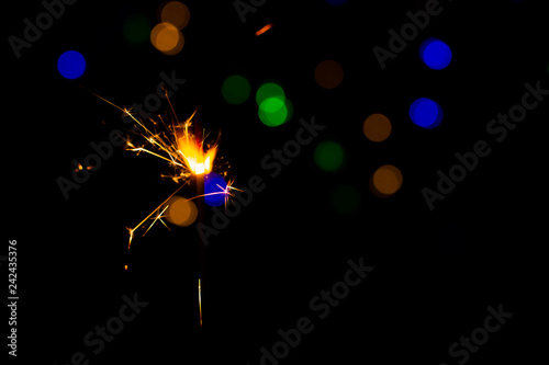 Christmas golden lights. Background of bright glow bokeh