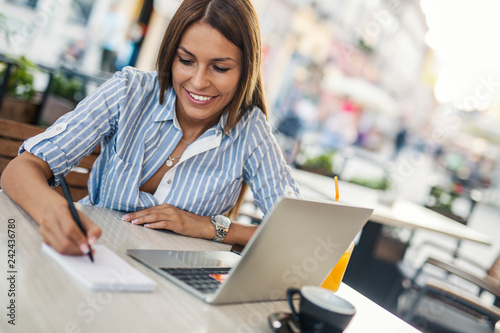 Female freelancer at cafe