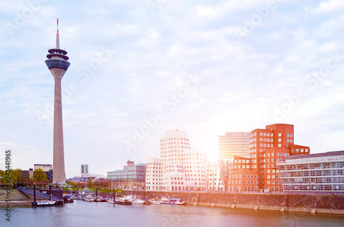 Media harbor with futuristic buildings and tower in Dusseldorf, Germany photo