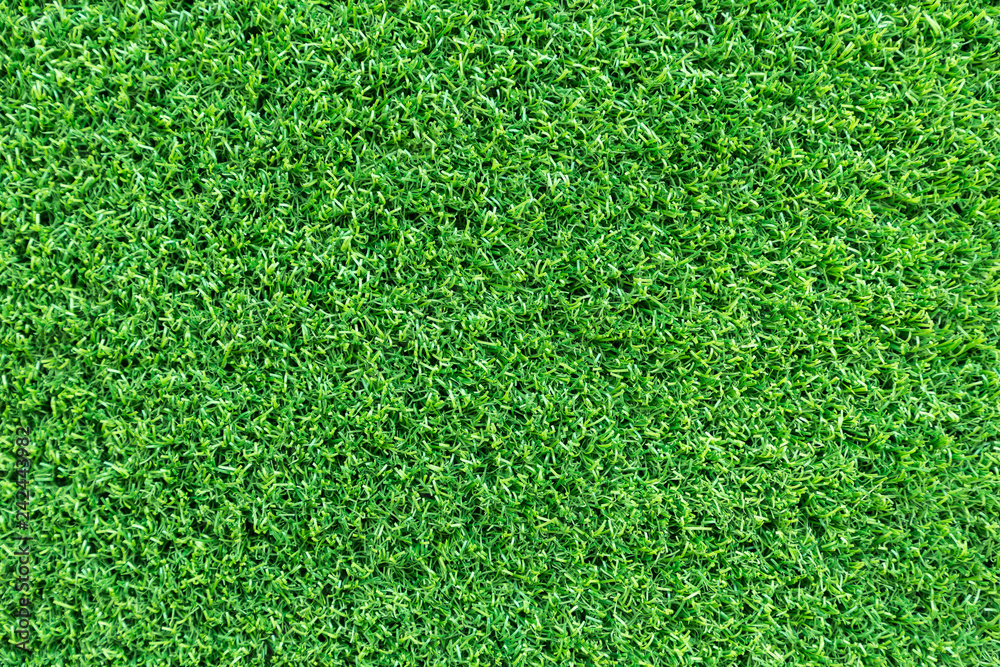 Fototapeta premium Grass texture background for golf course, soccer field or sports concept design. Artificial green grass.