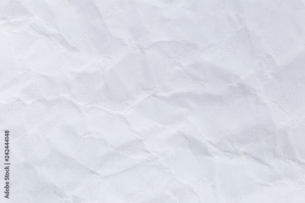 Obraz premium Crumpled white recycled paper background for business communication and education concept design.