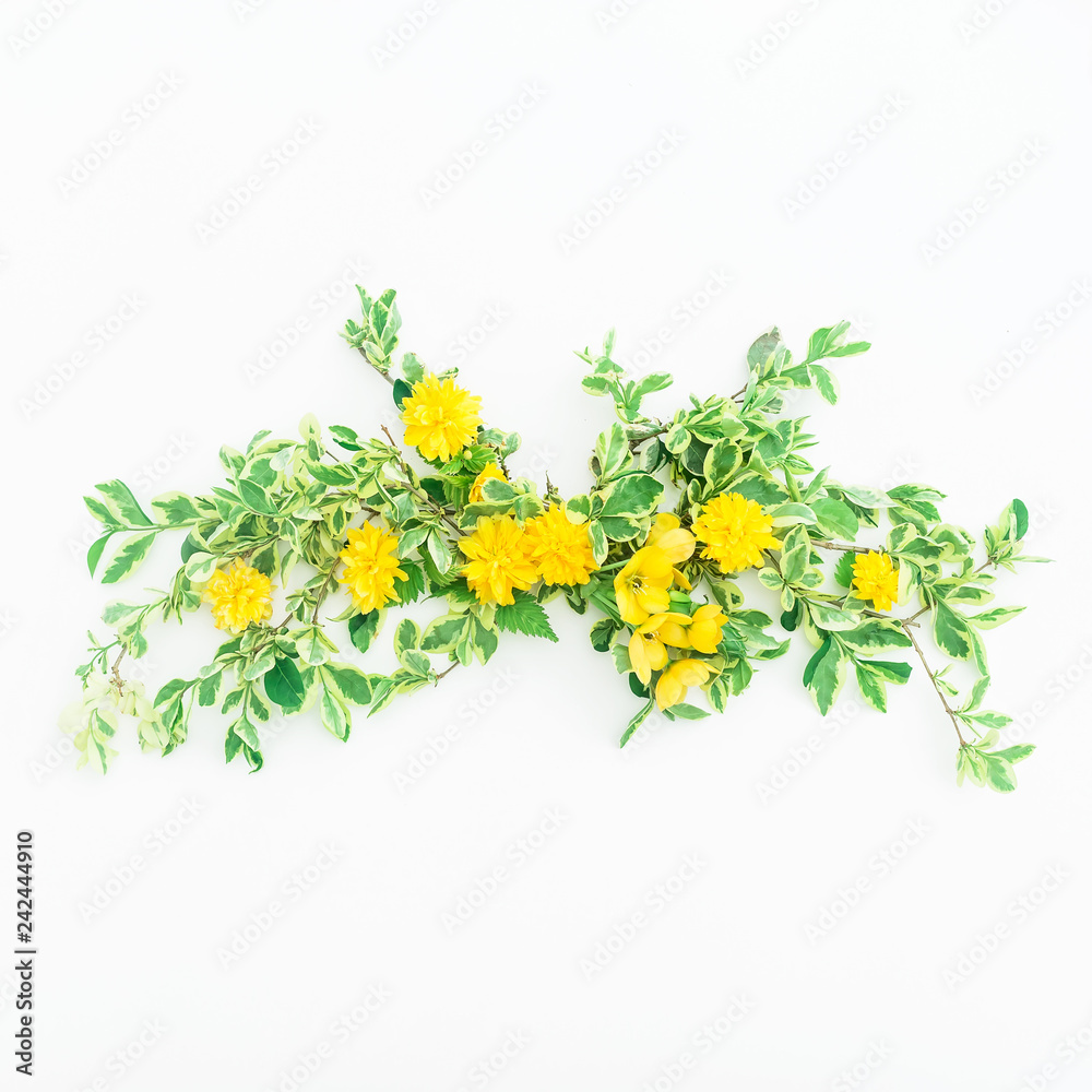 Floral composition of yellow flowers on white background. Flat lay, top view.
