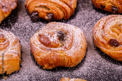 Puff pastry with raisin and icing sugar