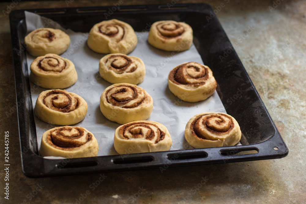 buns with cinnamon - Cinnabon cooking process. (food background). copy space buns with cinnamon - Cinnabon cooking process. (food background). copy space