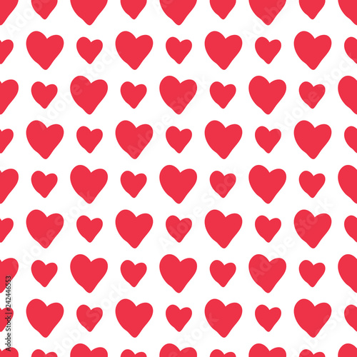 Vector hand-drawn hearts seamless pattern background in red and white. Appropriate for fabric, gift wrap, cards, for a Valentine Day, wedding, love themed projects.