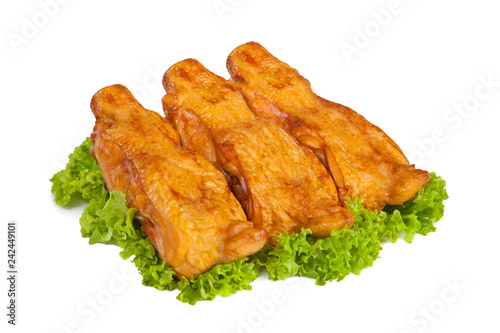 Smoked chicken back on lettuce green lettuce leaf. Isolated on white background