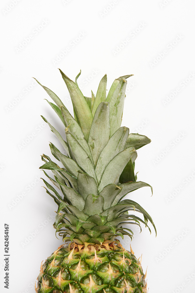 Fototapeta premium close up of tasty organic pineapple on white background