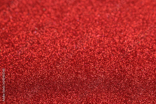 Beautiful texture of red sparkles. glitter background. shiny texture
