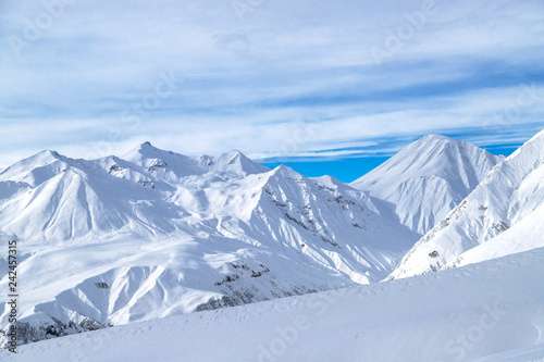 Wallpaper Mural The peaks of snowy Caucasus mountains in The Gudauri Ski Resort, Georgia. Snowboarding in The Gudauri Ski Resort, Georgia. Torontodigital.ca
