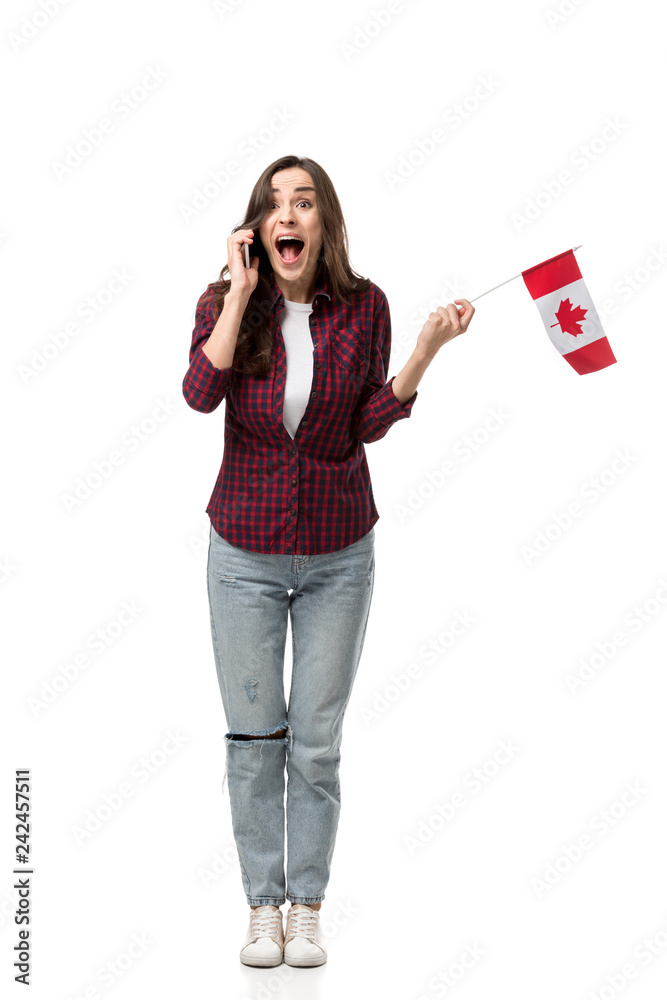 excited woman holding canadian flag and talking on smartphone isolated on white excited woman holding canadian flag and talking on smartphone isolated on white