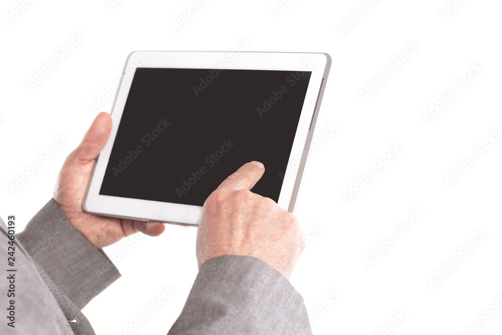 close up.businessman pointing finger at the blank screen tablet.