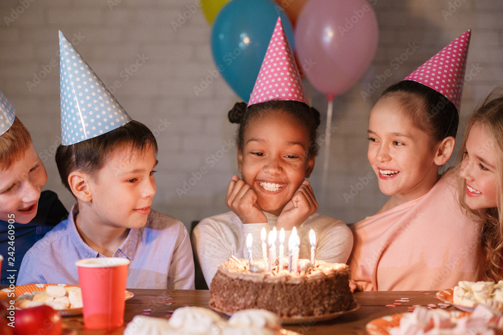 African-american girl having birthday party with friends African-american girl having birthday party with friends