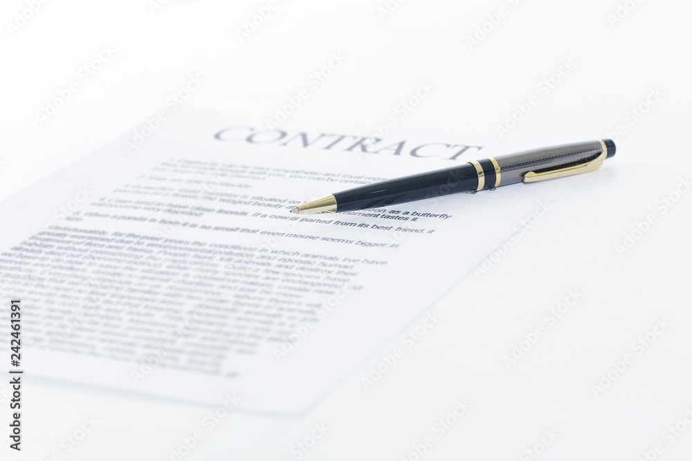 close up.contract and pen on the Desk close up.contract and pen on the Desk